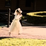 Wedding party, flower girl running