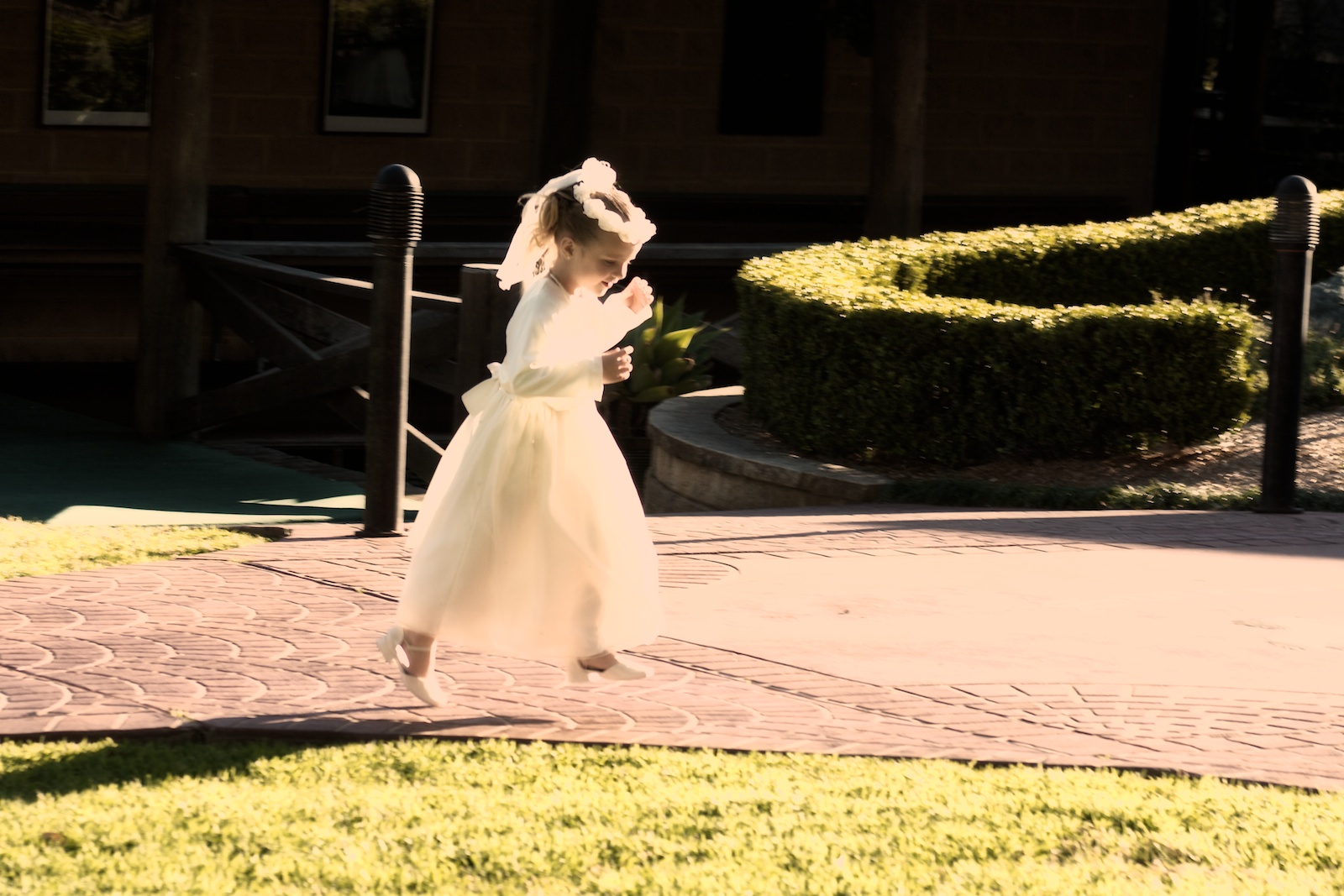 Wedding party, flower girl running